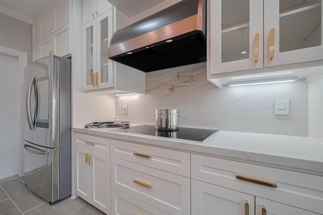 4 Rutgers Pl W, University Place, TX 77005 - kitchen featuring freestanding refrigerator, extractor fan, black electric cooktop, white cabinets, and glass insert cabinets