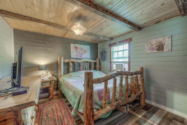 bedroom with cooling unit, beam ceiling, wooden ceiling, dark hardwood / wood-style floors, and wood walls