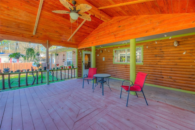 wooden deck featuring ceiling fan