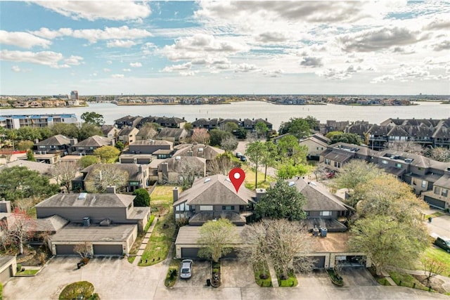 drone / aerial view featuring a water view