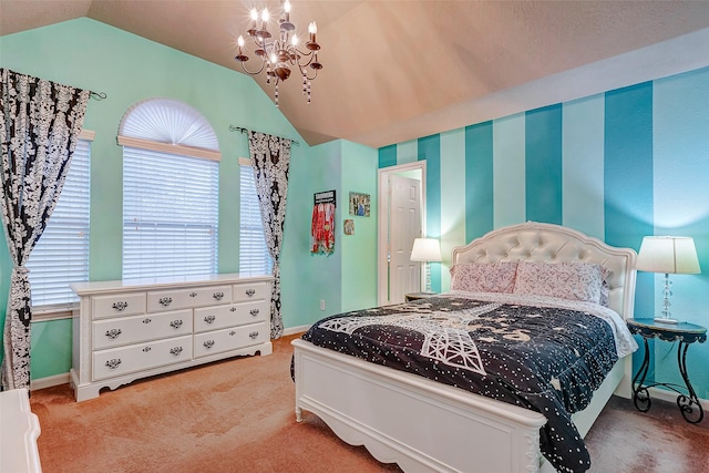 carpeted bedroom with a chandelier and lofted ceiling