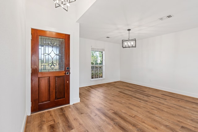 foyer with light wood-type flooring