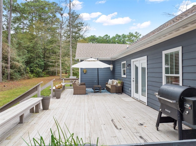 deck featuring grilling area, french doors, and outdoor lounge area