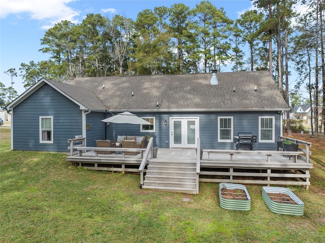 rear view of house with an outdoor hangout area, french doors, a deck, and a yard