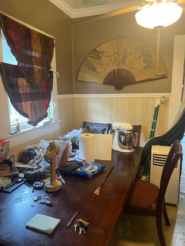 dining area with crown molding