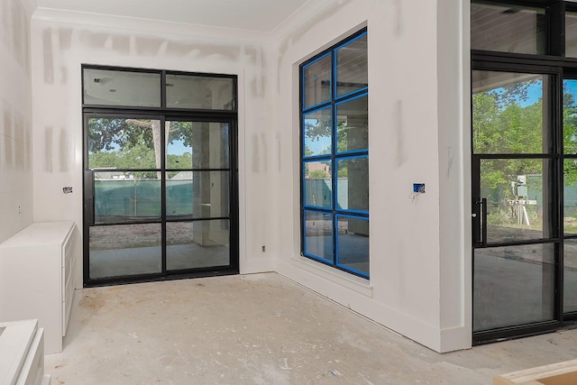 entryway with crown molding