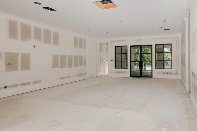 empty room featuring ornamental molding