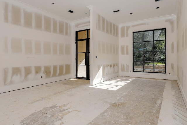 spare room with ornamental molding