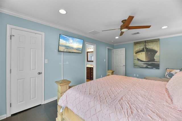 bedroom featuring dark wood-type flooring, ensuite bath, ceiling fan, and crown molding