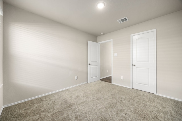 unfurnished bedroom with carpet