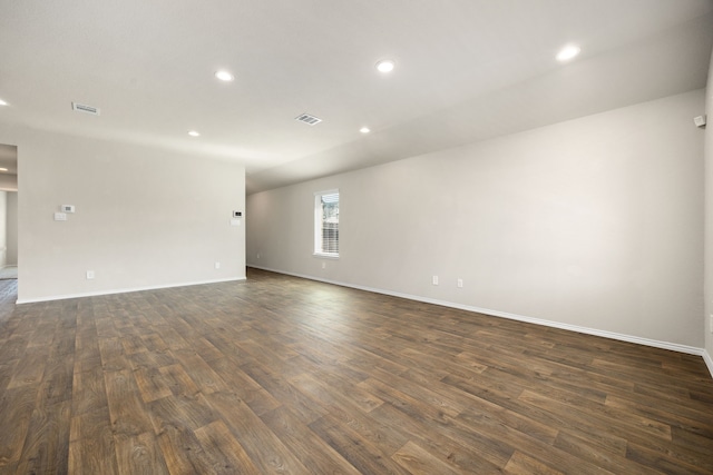 unfurnished room featuring dark hardwood / wood-style floors