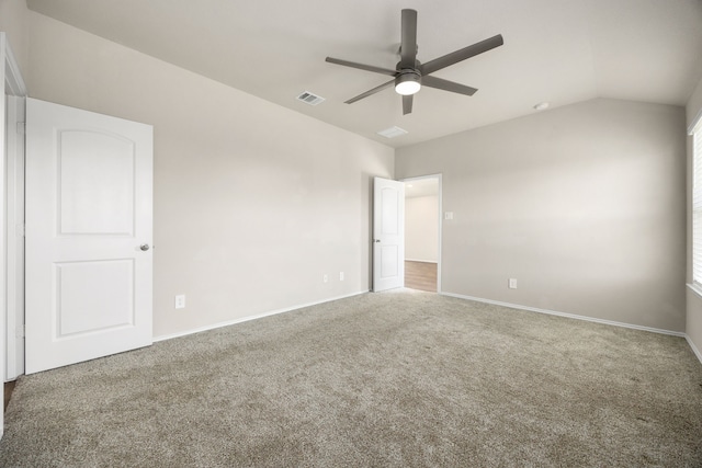 spare room with ceiling fan, carpet floors, and lofted ceiling