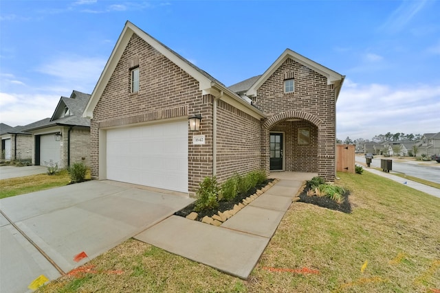 view of front facade with a garage and a front yard