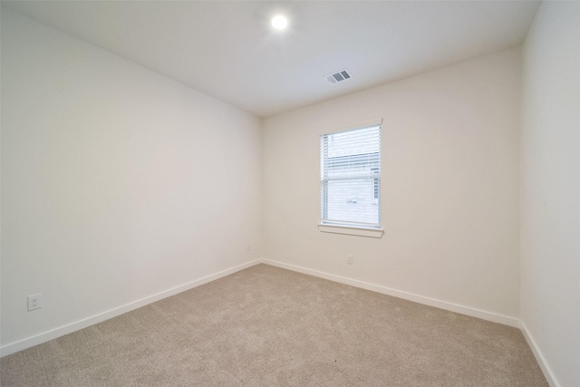 spare room with carpet