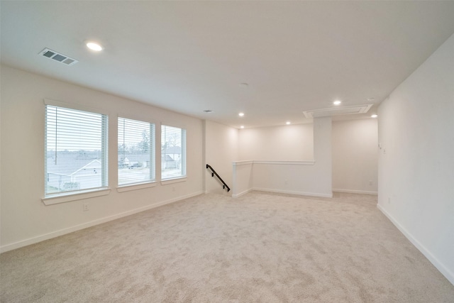 basement with light colored carpet