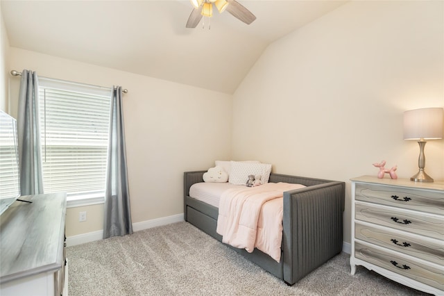 bedroom with ceiling fan, light carpet, and lofted ceiling