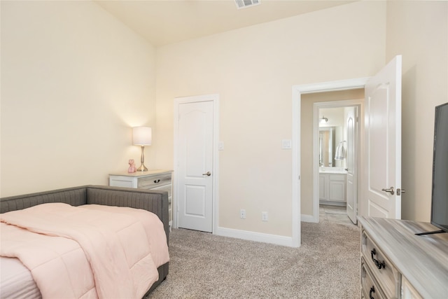 carpeted bedroom featuring vaulted ceiling