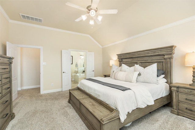 bedroom with connected bathroom, ceiling fan, crown molding, vaulted ceiling, and light carpet