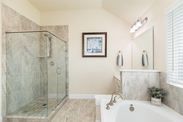 bathroom featuring vanity, plus walk in shower, and vaulted ceiling