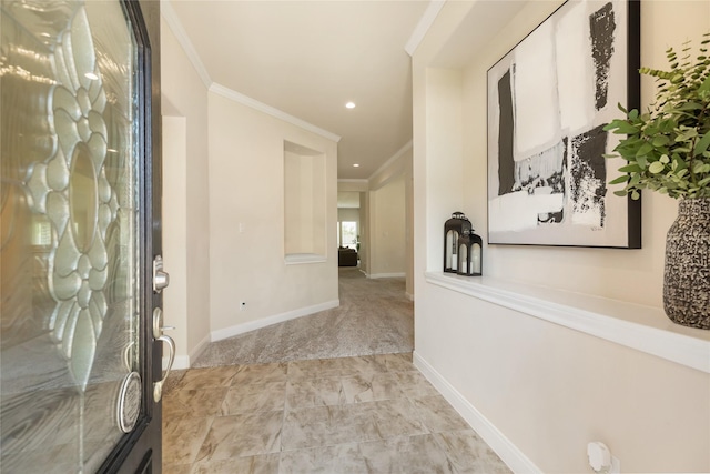 hall featuring light carpet and ornamental molding