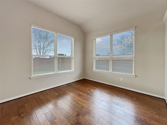 spare room featuring hardwood / wood-style flooring