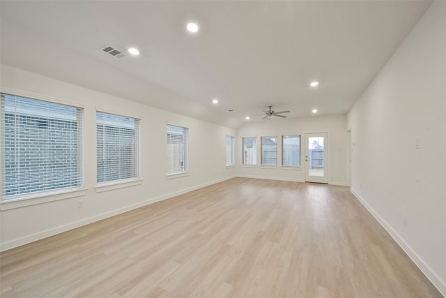 spare room featuring ceiling fan and light hardwood / wood-style flooring