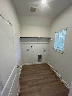 laundry room with hookup for an electric dryer, hookup for a gas dryer, dark hardwood / wood-style flooring, and hookup for a washing machine