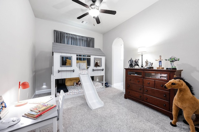 carpeted bedroom featuring ceiling fan