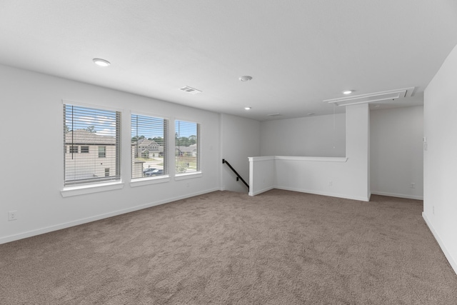 unfurnished room featuring carpet