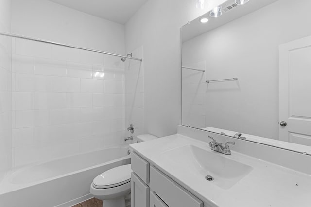 full bathroom with vanity, toilet, and shower / bathtub combination