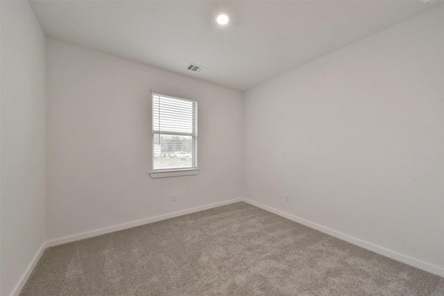 view of carpeted spare room