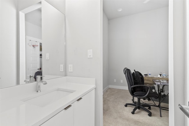 interior space featuring light carpet and sink