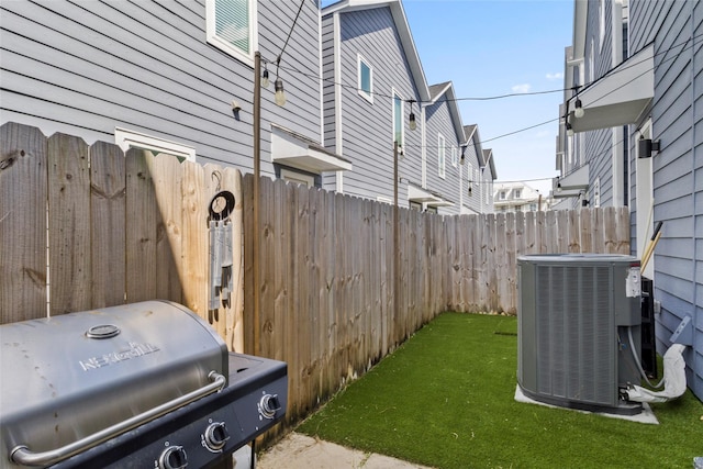 view of yard featuring central AC