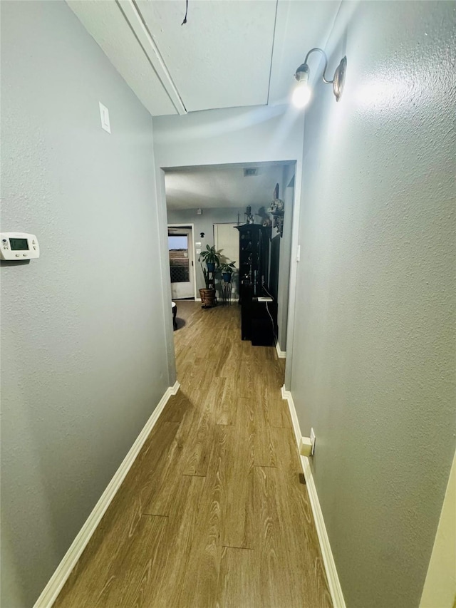 hall featuring hardwood / wood-style floors