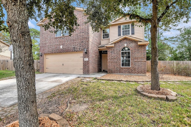 front of property featuring a garage and a front lawn