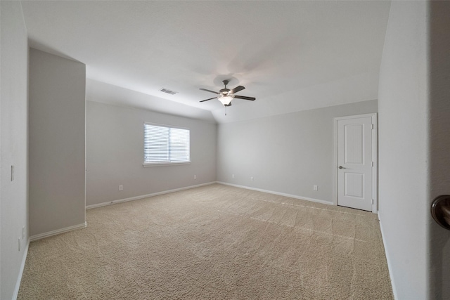 unfurnished room featuring light colored carpet and ceiling fan