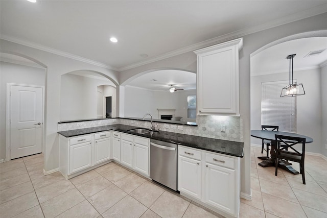 kitchen featuring white cabinets, dishwasher, ceiling fan, and sink