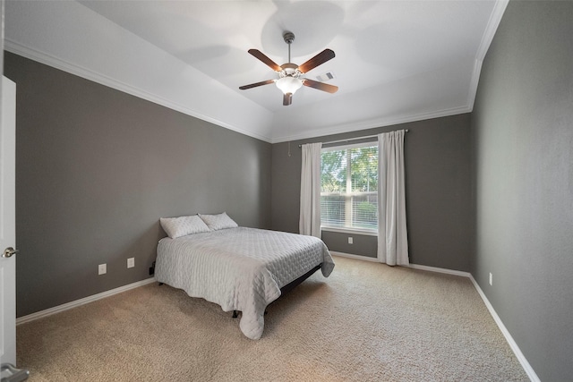 bedroom featuring ceiling fan, light carpet, and ornamental molding