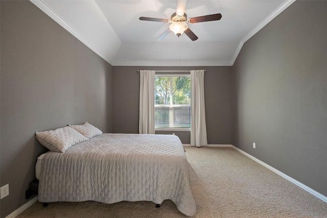 bedroom with ceiling fan, carpet, lofted ceiling, and ornamental molding