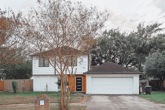 view of front of property with a garage