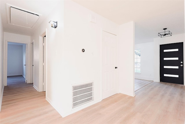 hallway featuring light wood-type flooring