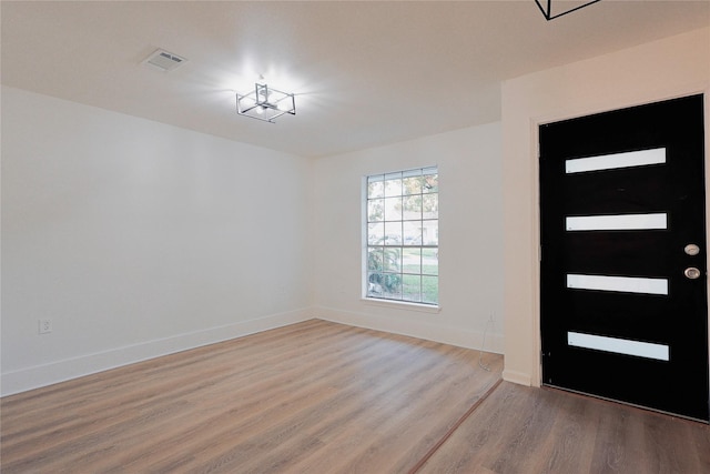 foyer with light hardwood / wood-style flooring