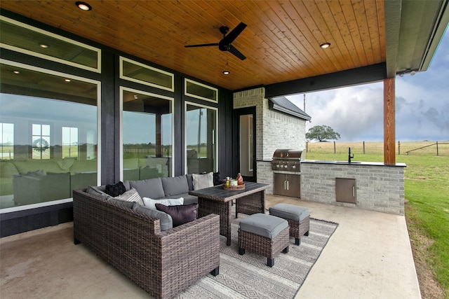 view of patio / terrace with ceiling fan, sink, a grill, an outdoor hangout area, and area for grilling