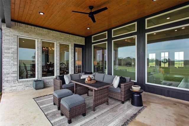 view of patio / terrace with an outdoor living space and ceiling fan