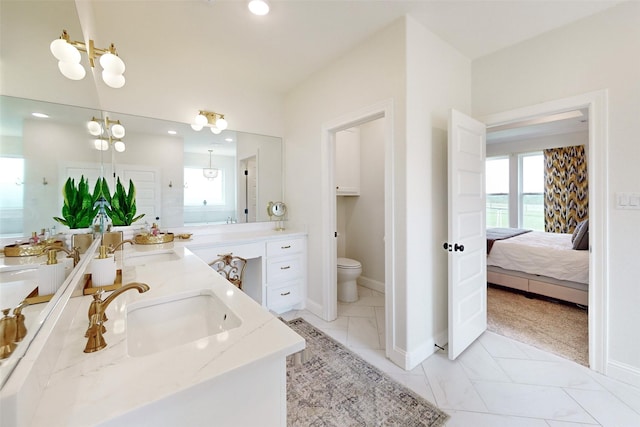 bathroom featuring vanity, a water view, toilet, and walk in shower