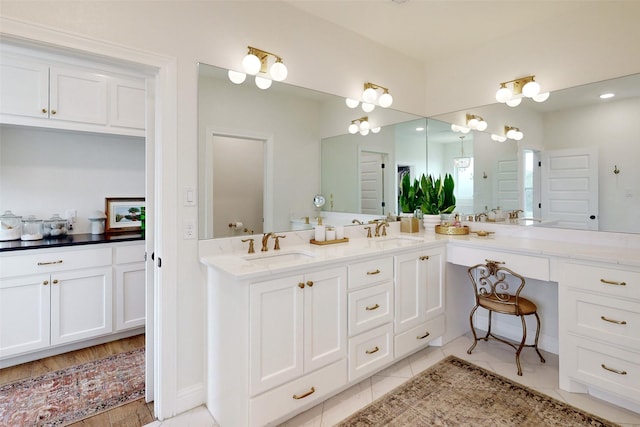 bathroom featuring tile patterned floors and vanity