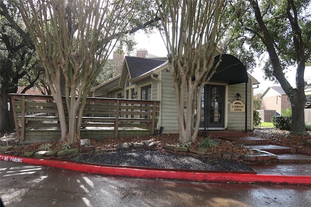 view of front of property with a deck