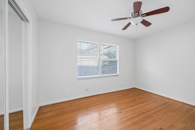 empty room featuring light hardwood / wood-style floors and ceiling fan