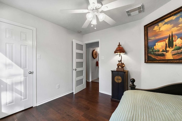 bedroom featuring ceiling fan and dark hardwood / wood-style flooring