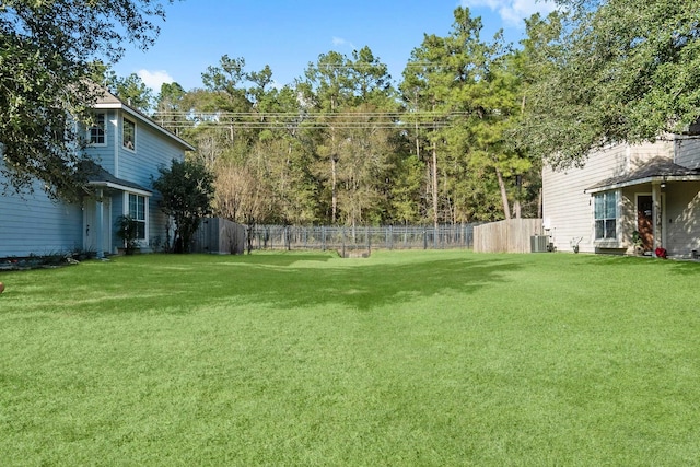 view of yard featuring central AC